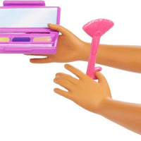 Barbie Makeup Artist Doll with Teal Hair brings beauty salon fun to imaginative playtime.
