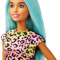 Barbie Makeup Artist Doll with Teal Hair, featuring a vibrant look and creative play accessories.
