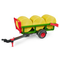 Bruder Self Loading Bale Trailer with 3 Round Bales picture on the white background