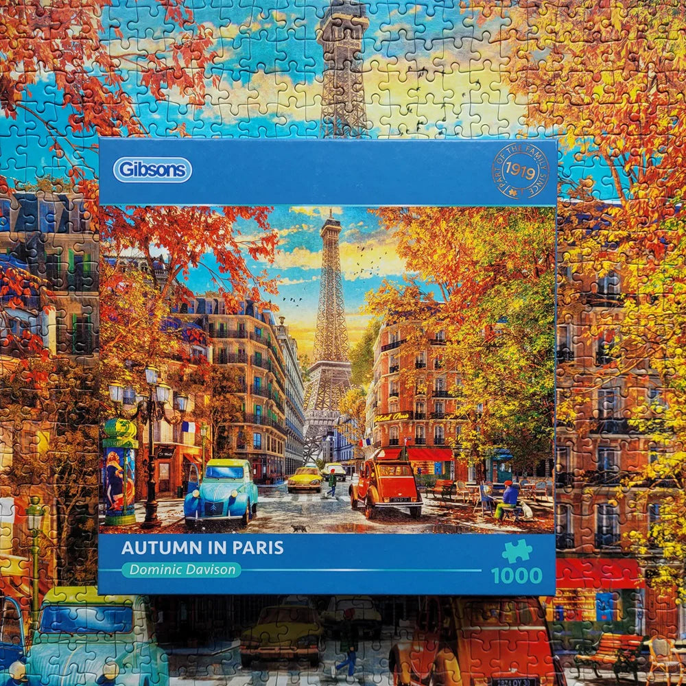 The Gibsons - Autumn in Paris 1000 Piece Jigsaw Puzzle showcases a beret-wearing artist capturing Paris’s golden season.
