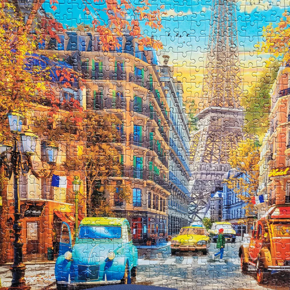 The Gibsons - Autumn in Paris 1000 Piece Jigsaw Puzzle offers a relaxing and visually stunning experience.
