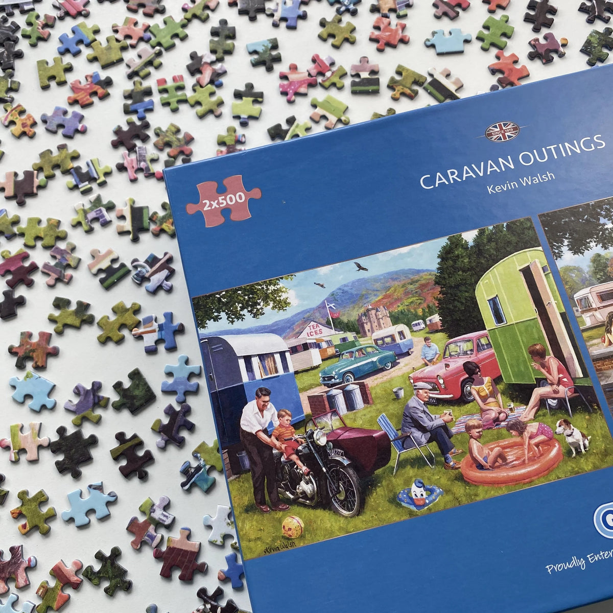 "Explore 1960s caravan holidays in the Scottish Highlands with Gibsons - Caravan Outings 2 x 500 Piece Jigsaw Puzzles."
