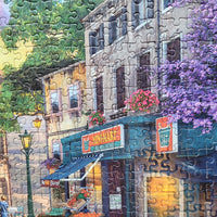 "Gibsons - Morning in the Med" 1000-piece puzzle depicting a charming Mediterranean street.
