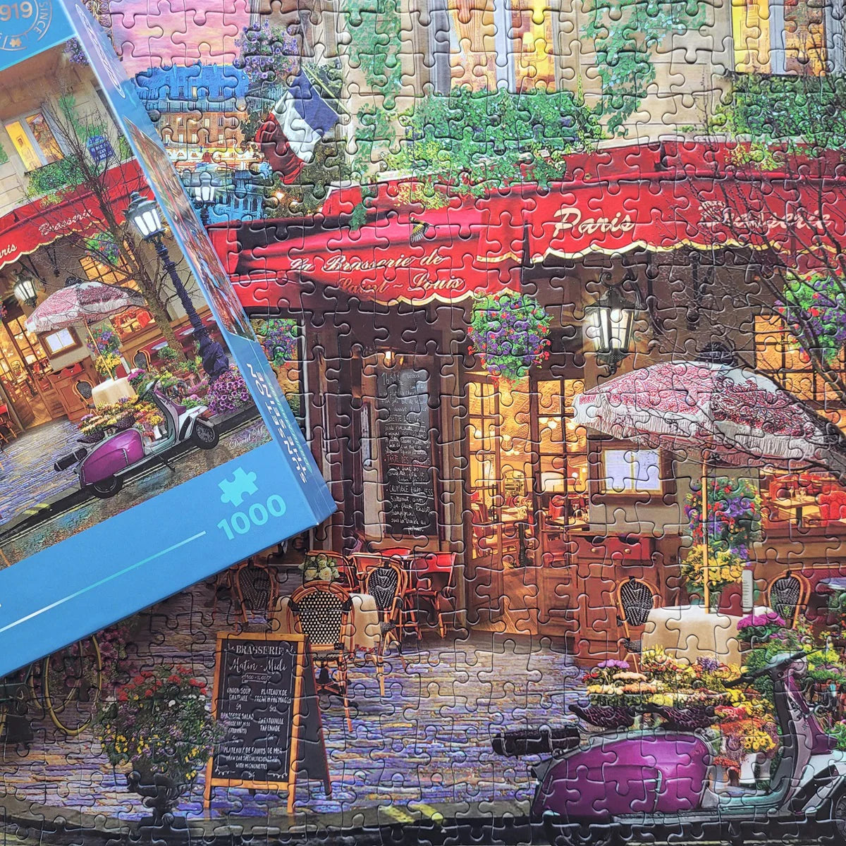 A peaceful Parisian evening depicted in Gibsons - Sunset on the Seine puzzle with 1000 pieces.
