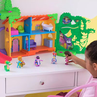 girl playing with dora figure 