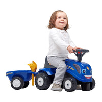 toddler on ride on tractor 