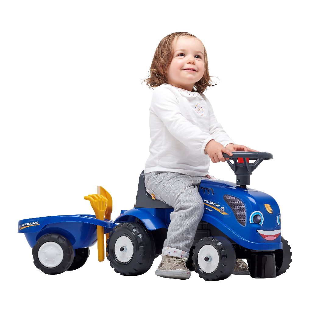 toddler on ride on tractor 