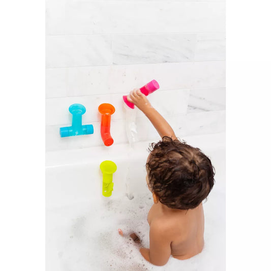 child playing with bath toy sets 