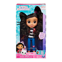 Retail packaging of a doll on a white background.