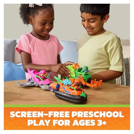 two kids playing with the Paw Patrol vehicle toys on a table.