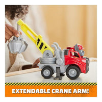 Child playing with construction vehicle toy from another angle.