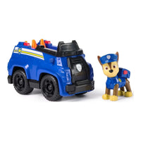 Side view of vehicle figurine with character standing beside on a white background.