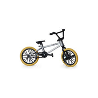 A silver and black BMX bike against a white background.