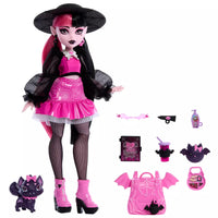 pink and black doll with pink and black accessories 