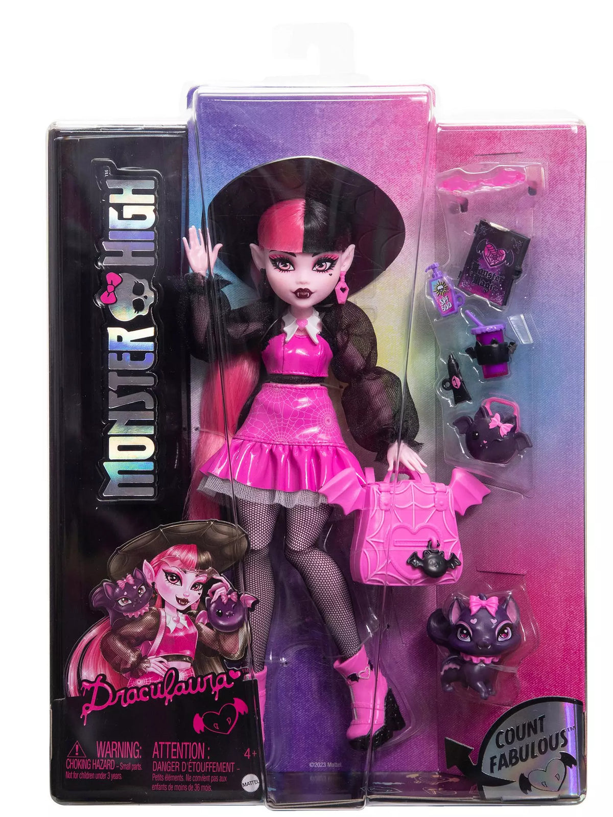 pink and black doll in packaging 