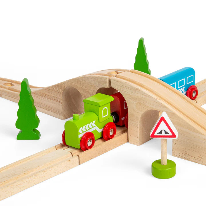 wooden train going under arch of wooden train track 