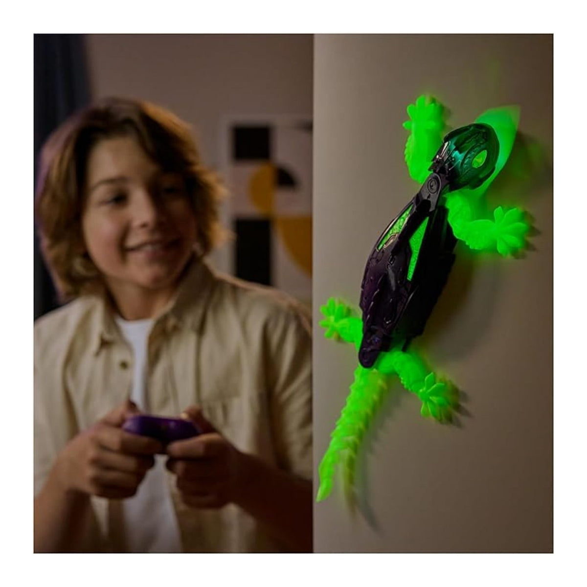 gecko lit up and on wall with a boy  holding a remote controller to the side.