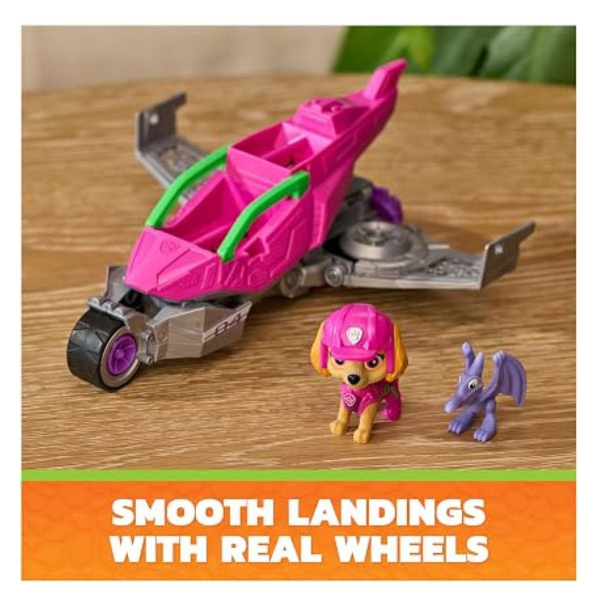 Pink vehicle with two characters sitting beside showcasing the wheels on the vehicle 