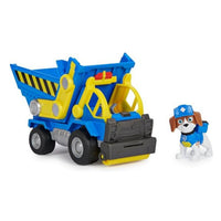Paw Patrol vehicle figurine with small character beside it against a white background.