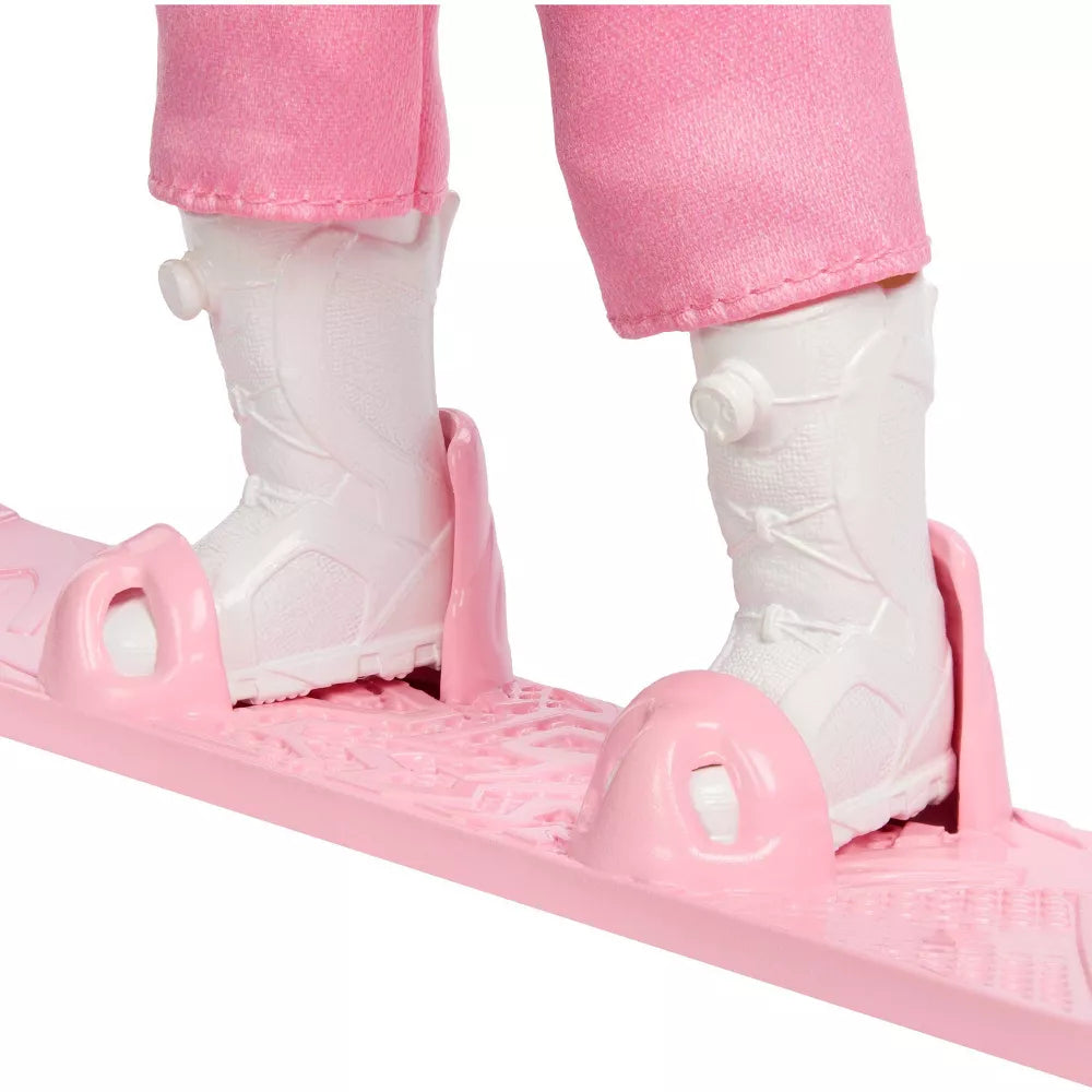 close up of boots of barbie snowboarder 