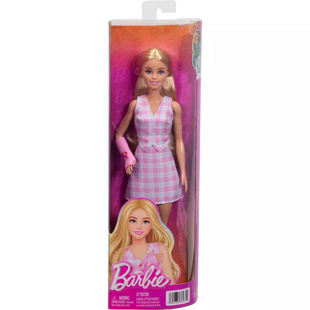 barbie doll with cast in packaging 