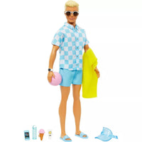 ken barbie doll with beach accessories on white background 