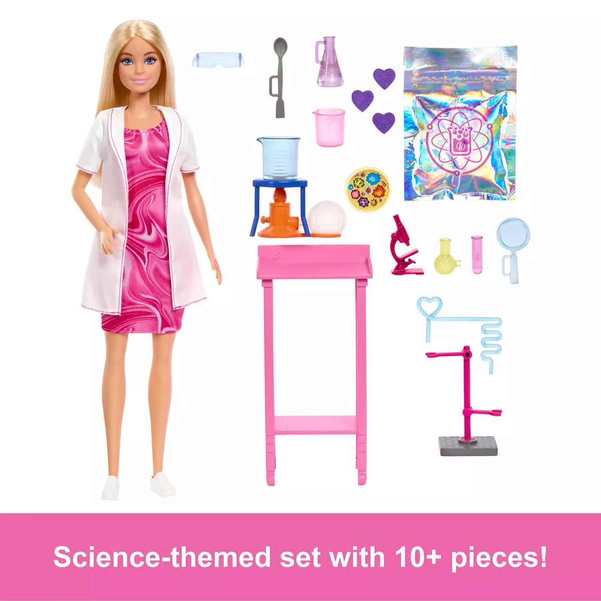 scientist barbie with 10 accessories laid out on white background 