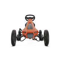 orange go-kart on white background 