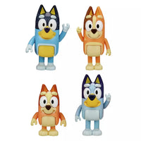 four dog mini figures on white background 