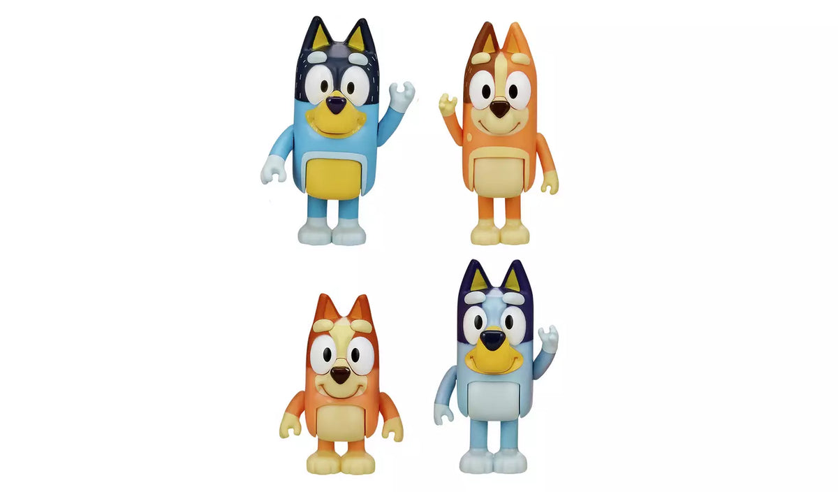 four dog mini figures on white background 