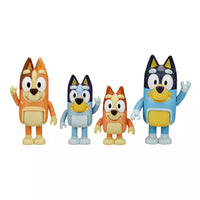 four dog mini figures on white background 