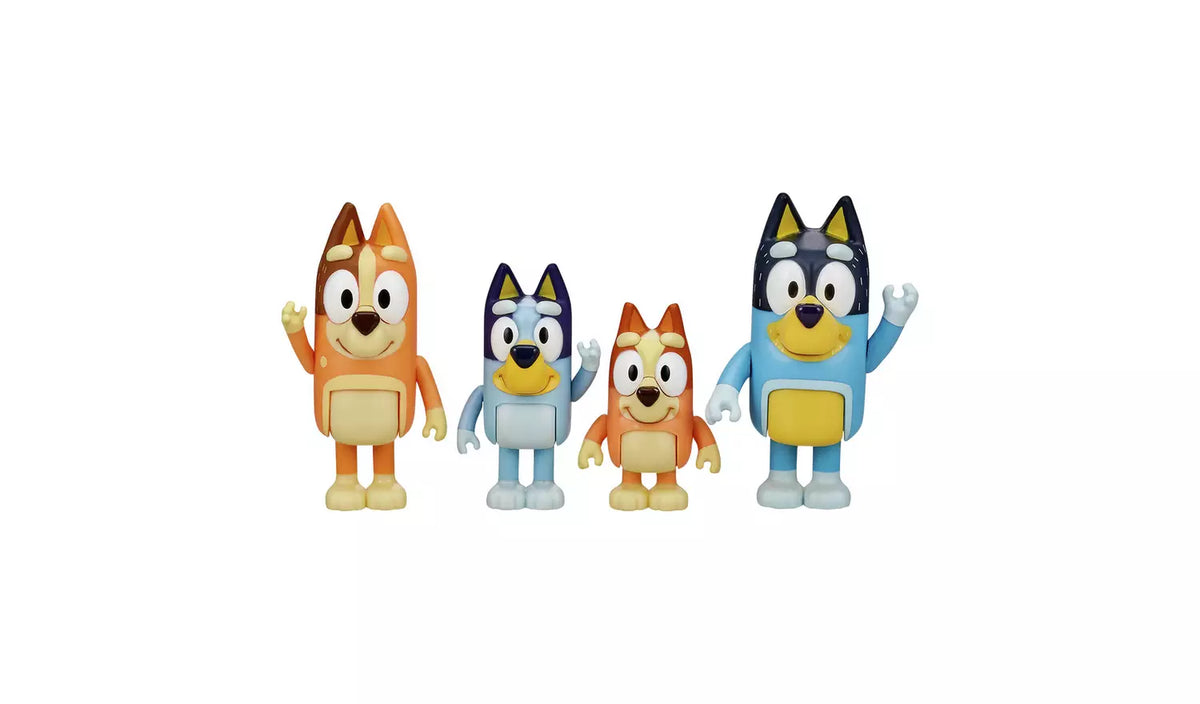four dog mini figures on white background 