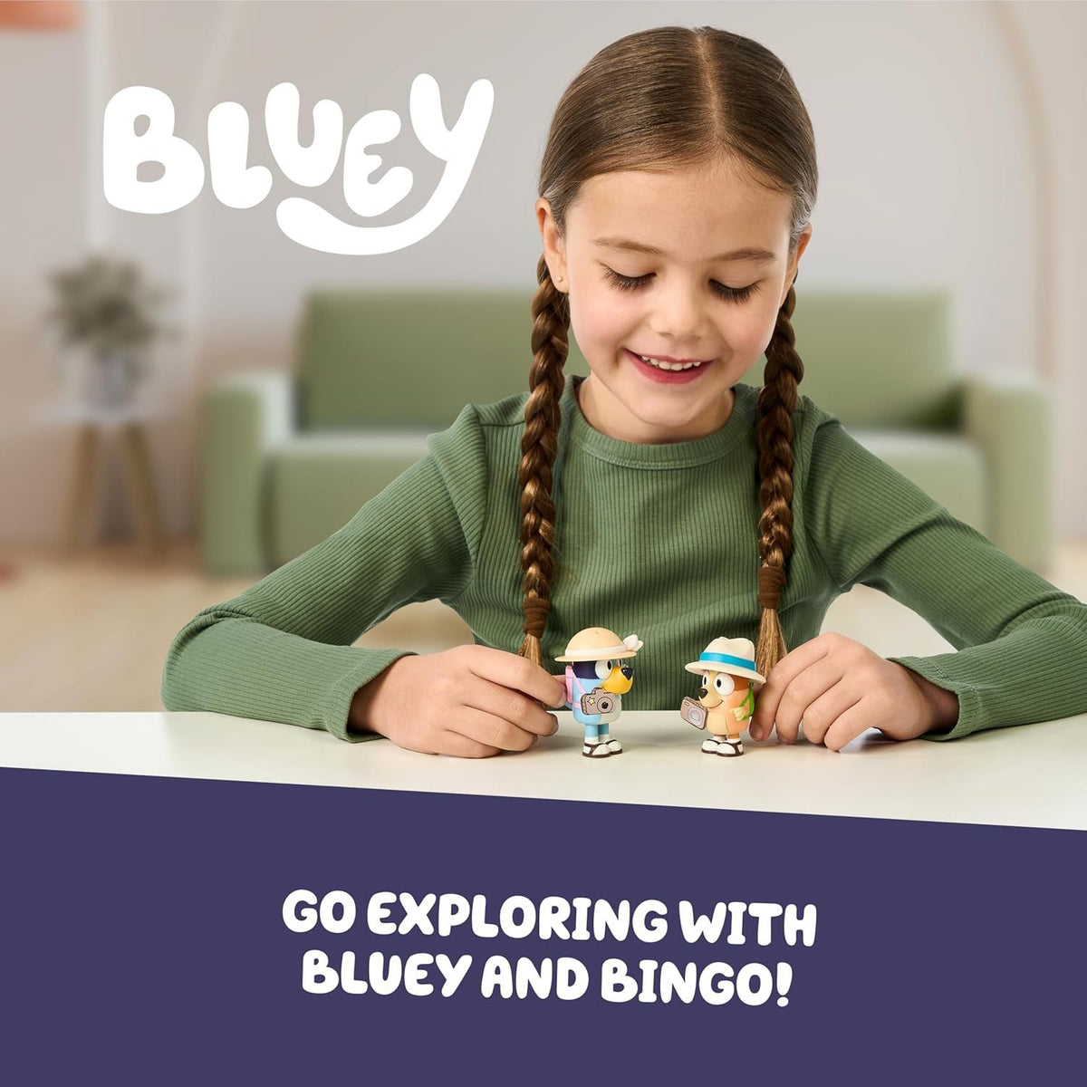girl playing with bluey figurines 