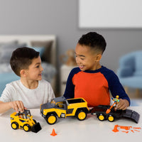 children playing with workforce skid steer toys