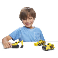 child playing with die cast construction vehicle 