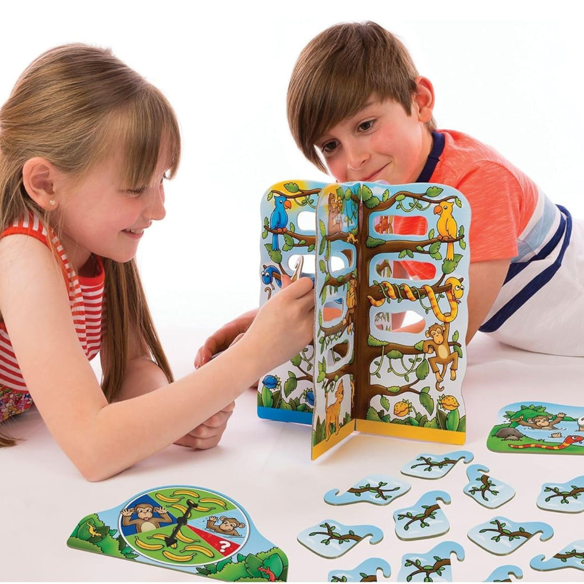 two kids playing with cheeky monkeys game 