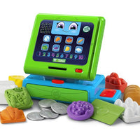 green and blue toy till with accessories 