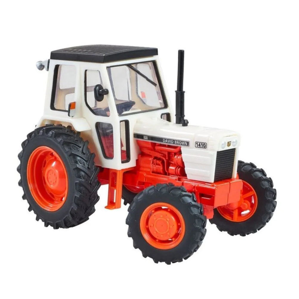 red and white vintage tractor model 