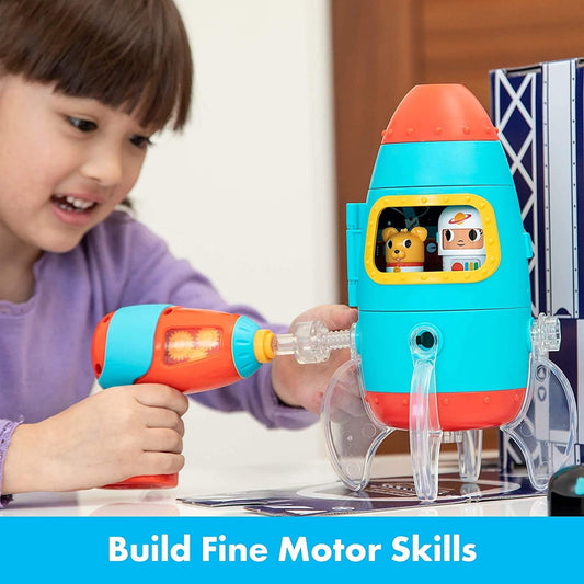 girl playing with design and drill toy  