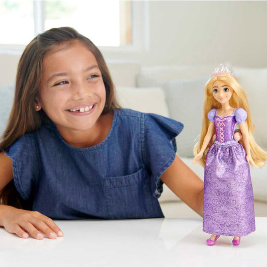 girl playing with rapunzel doll 