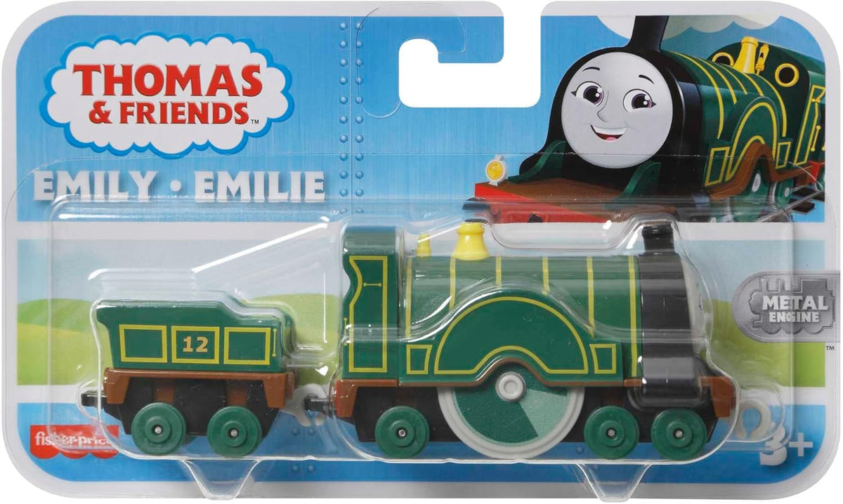 dark green and yellow train engine with extra car attachment on white background in packaging 