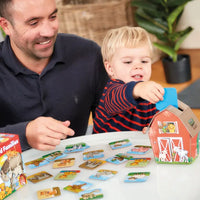 child and parent playing farmyard families game