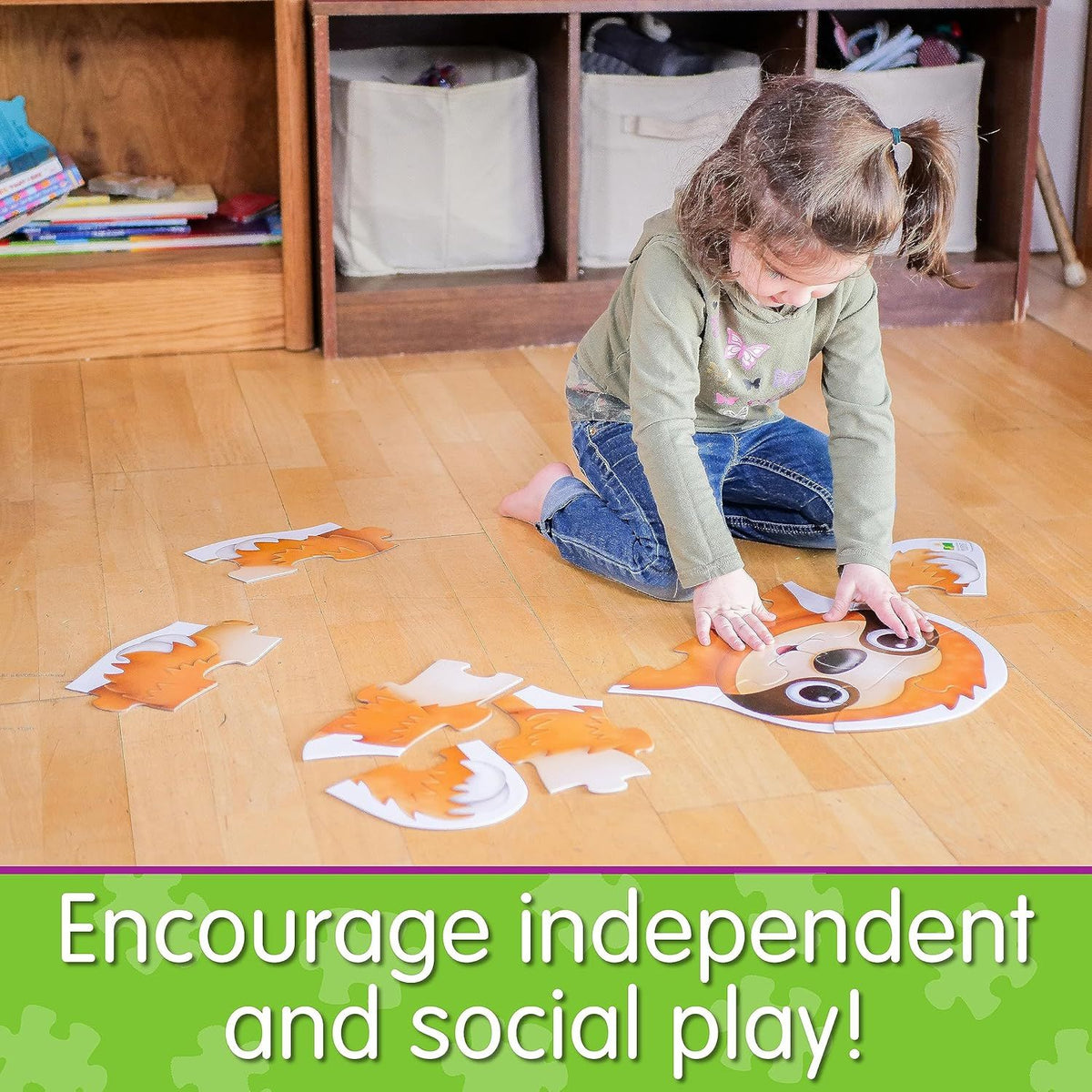 child playing with sleepy sloth floor puzzle 