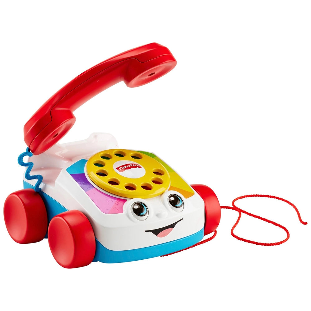 colourful children's rotary phone on white background 