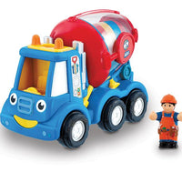 toy cement mixer and figurine on white background 