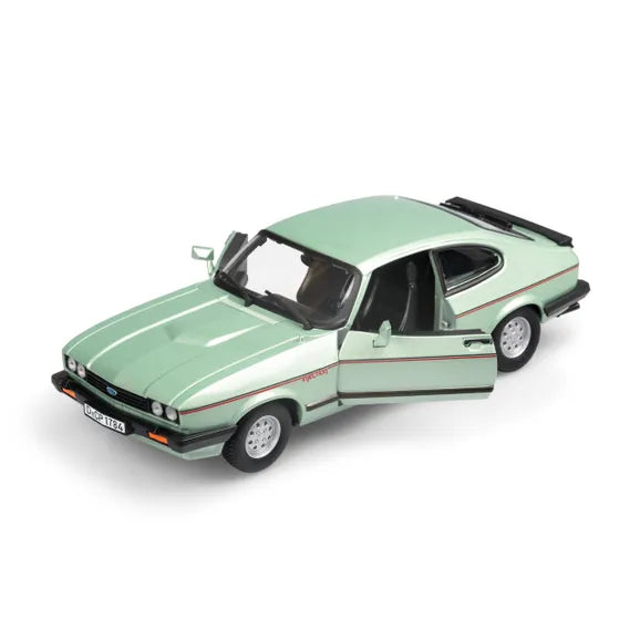 light green model car from the side 