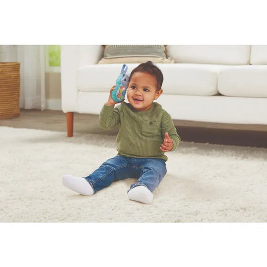child playing with hippo phone 