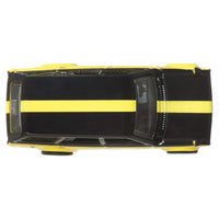 yellow and black model car on white background 