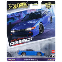 bright blue model car in blister packaging on white background