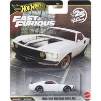 white toy car in packaging 